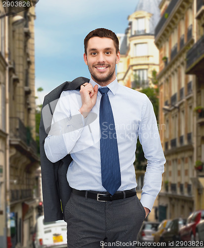 Image of smiling young and handsome businessman