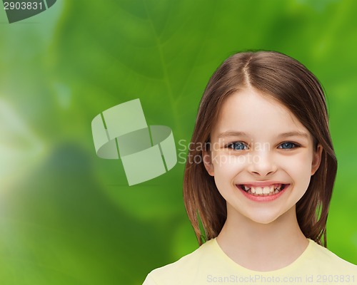 Image of smiling little girl over white background