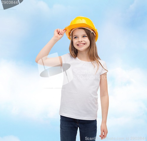 Image of smiling little girl in protective helmet