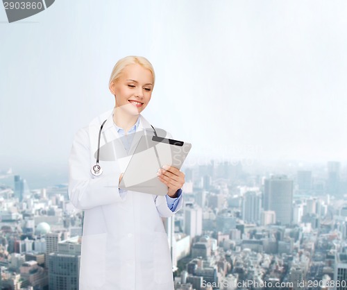 Image of female doctor with stethoscope and tablet pc