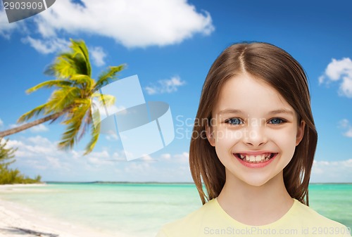 Image of smiling little girl over white background