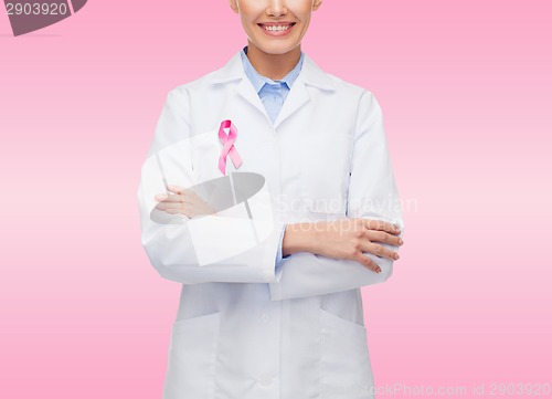 Image of close up of doctor with cancer awareness ribbon