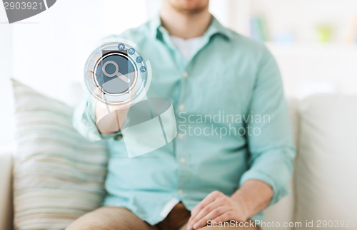 Image of close up of man with tablet pc computer at home