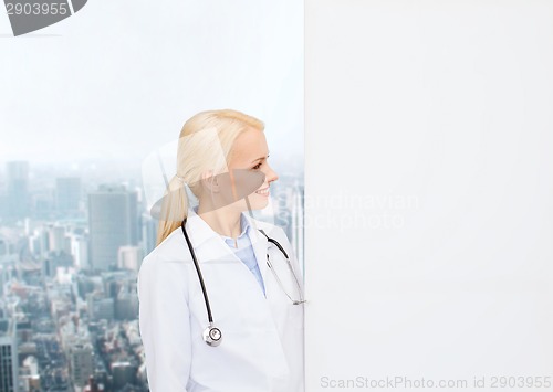 Image of smiling female doctor with stethoscope
