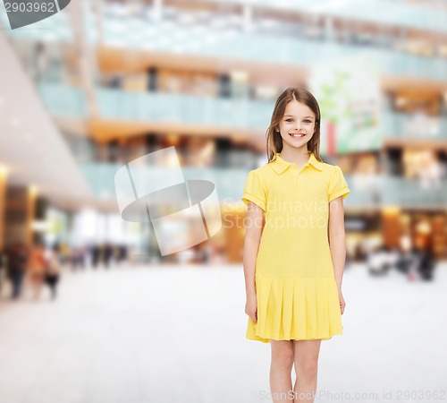 Image of smiling little girl in yellow dress