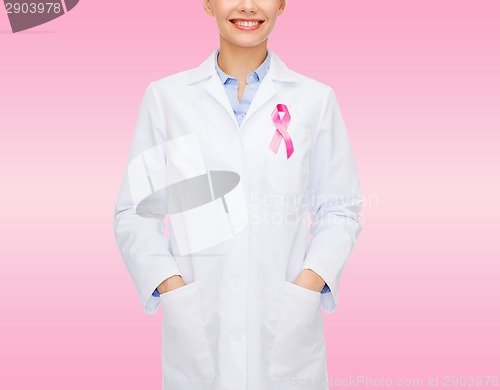 Image of close up of doctor with cancer awareness ribbon