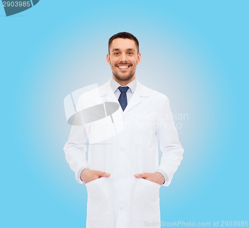 Image of smiling male doctor in white coat