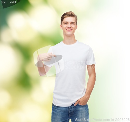 Image of smiling young man in blank white t-shirt