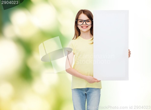 Image of little girl wearing eyeglasses with blank board