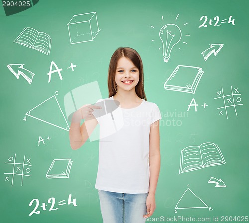 Image of smiling little girl in white blank t-shirt