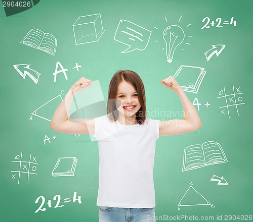 Image of smiling little girl in white blank t-shirt