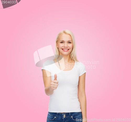 Image of woman showing thumbs up