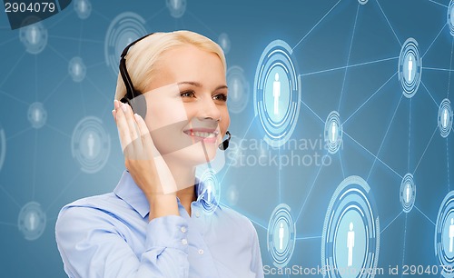 Image of friendly female helpline operator