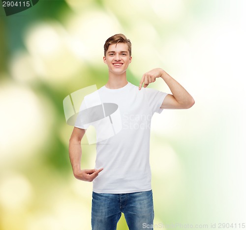 Image of smiling young man in blank white t-shirt