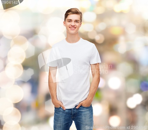 Image of smiling young man in blank white t-shirt