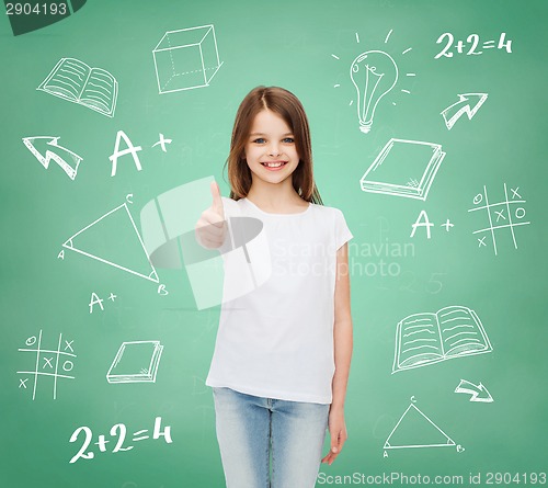 Image of smiling little girl in white blank t-shirt