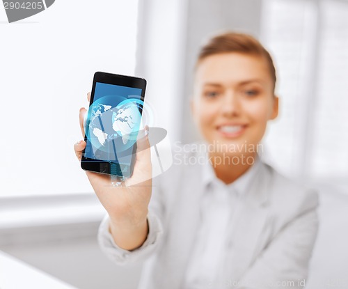 Image of close up of businesswoman with smartphone