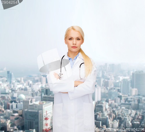 Image of serious female doctor with stethoscope