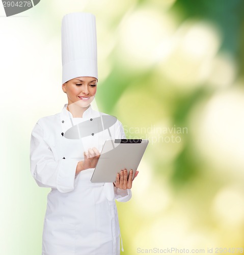 Image of smiling female chef with tablet pc computer