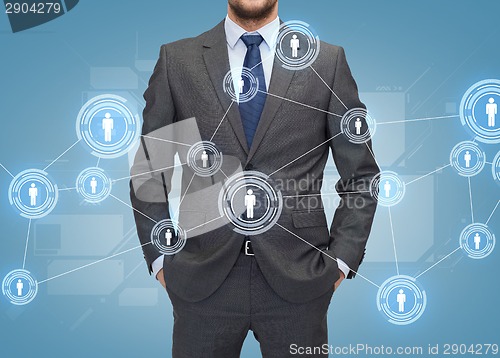 Image of close up of businessman over blue background