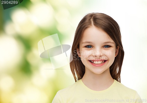 Image of smiling little girl over white background