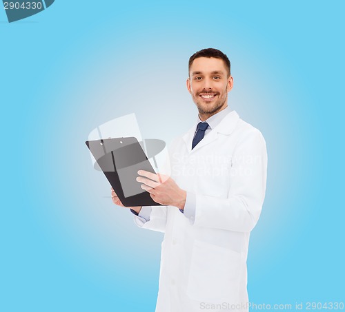 Image of smiling male doctor with clipboard