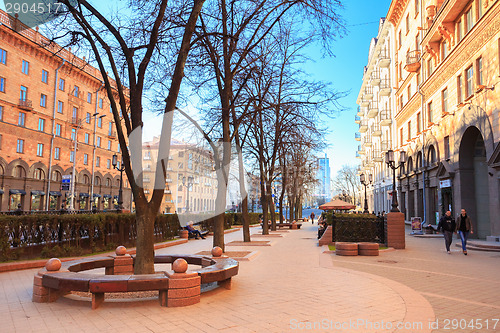 Image of People walking on the sidewalk on Lenin Street in spring in Mins