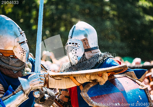 Image of Knights in a fight with swords