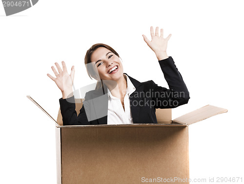 Image of Business woman appear inside a big card box