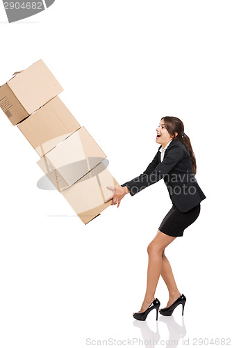 Image of Stumbling with a pile of card boxes