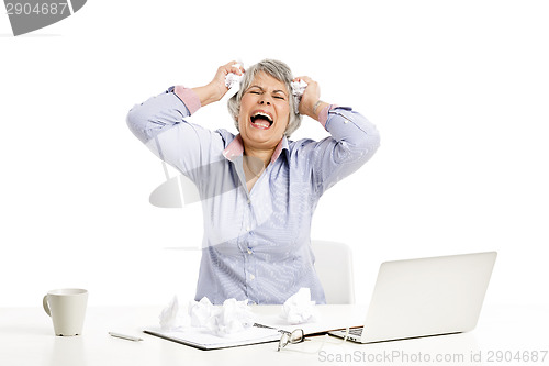 Image of Ellderly woman working with a laptop