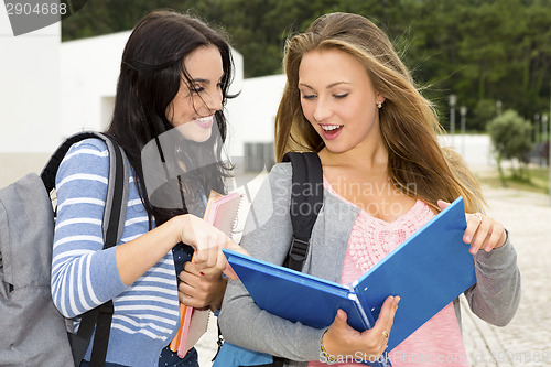 Image of Two beautiful teenage students