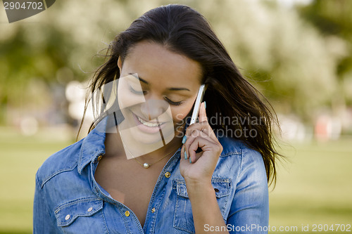 Image of Beautiful woman talking at phone