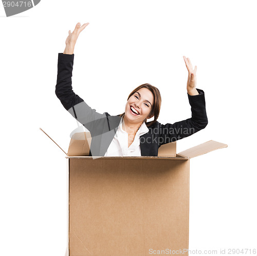 Image of Business woman appear inside a big card box