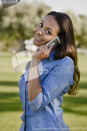 Image of Beautiful woman talking at phone