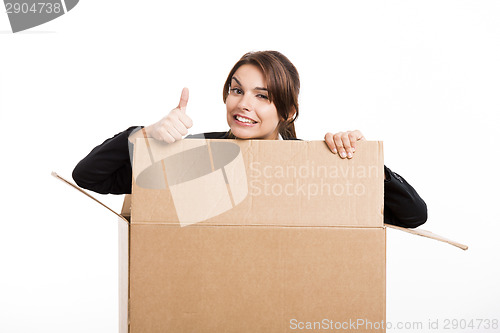 Image of Business woman appear inside a big card box