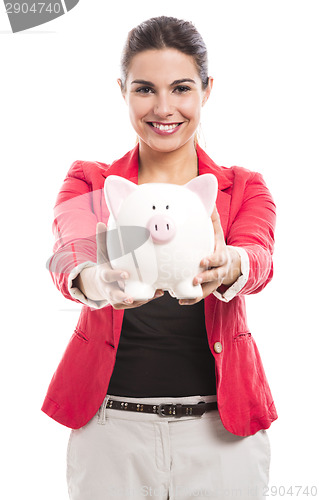 Image of Business woman with a piggy bank