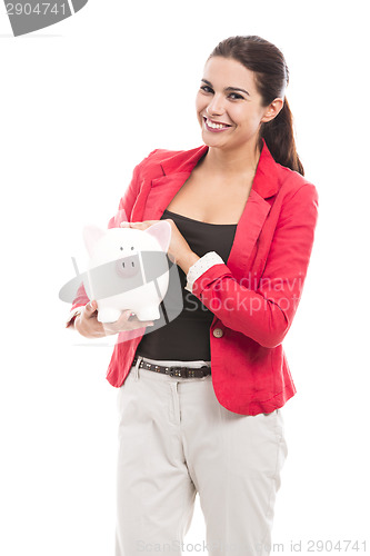 Image of Business woman with a piggy bank