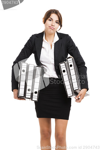 Image of Business woman holding folders