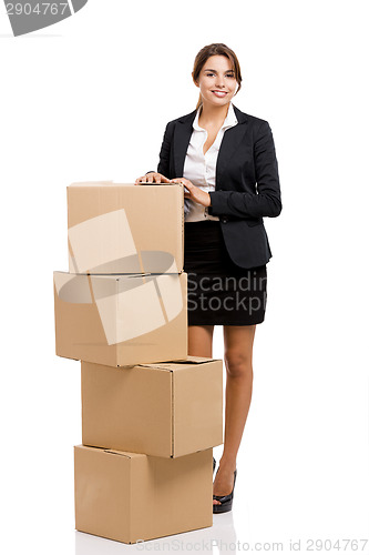 Image of Business woman with card boxes