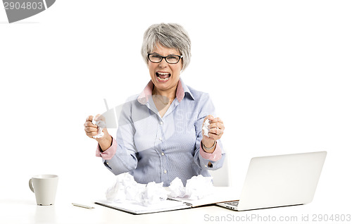 Image of Ellderly woman working with a laptop