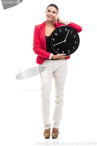 Image of Business woman holding a clock