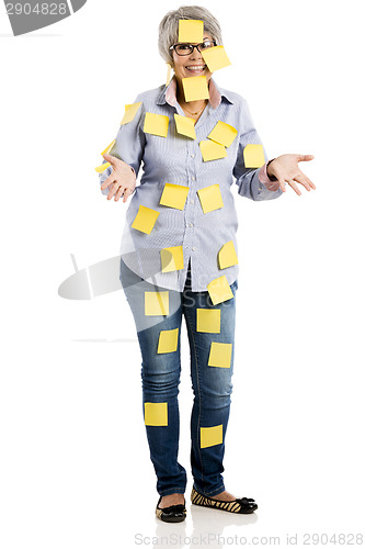 Image of Elderly woman with yellow notes