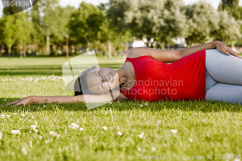 Image of Woman resting in the park