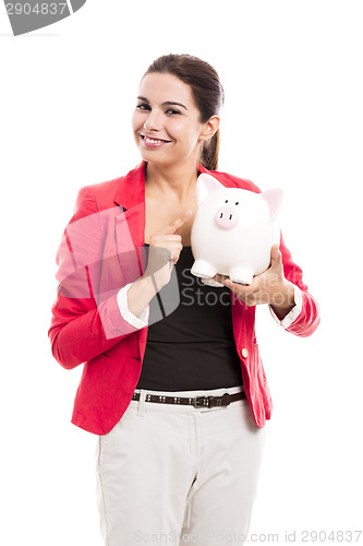 Image of Business woman with a piggy bank