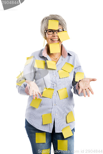 Image of Elderly woman with yellow notes