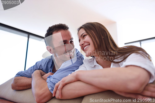 Image of relaxed young couple at home