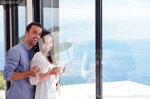 Image of relaxed young couple at home