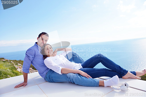 Image of relaxed young couple at home