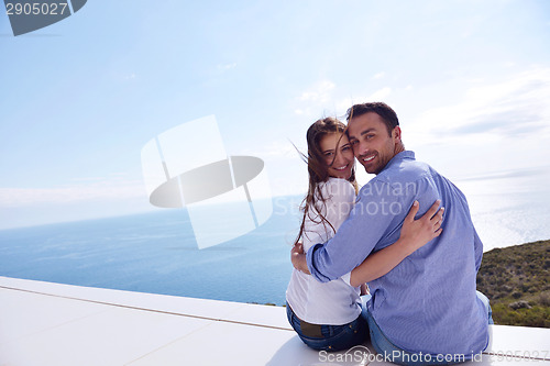 Image of relaxed young couple at home